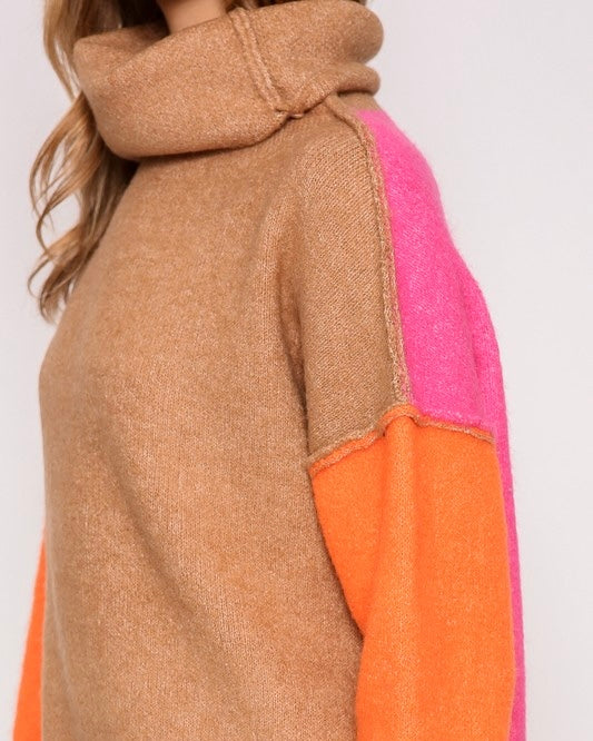 Soft turtleneck colorblock sweater featuring contrasting pink, orange, and brown panels for a stylish everyday look.
turtleneck sweater women, fall winter knitwear, chic casual outfit, soft cozy sweater, color block style